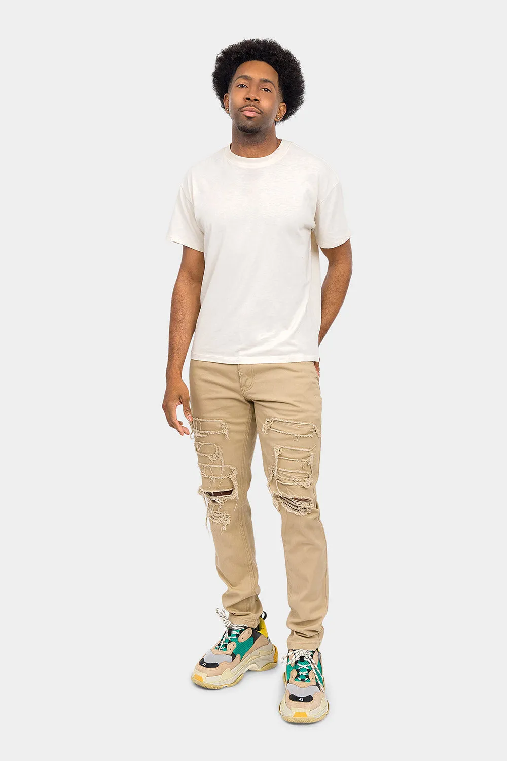 Distressed Solid Color Slim Fit Jeans