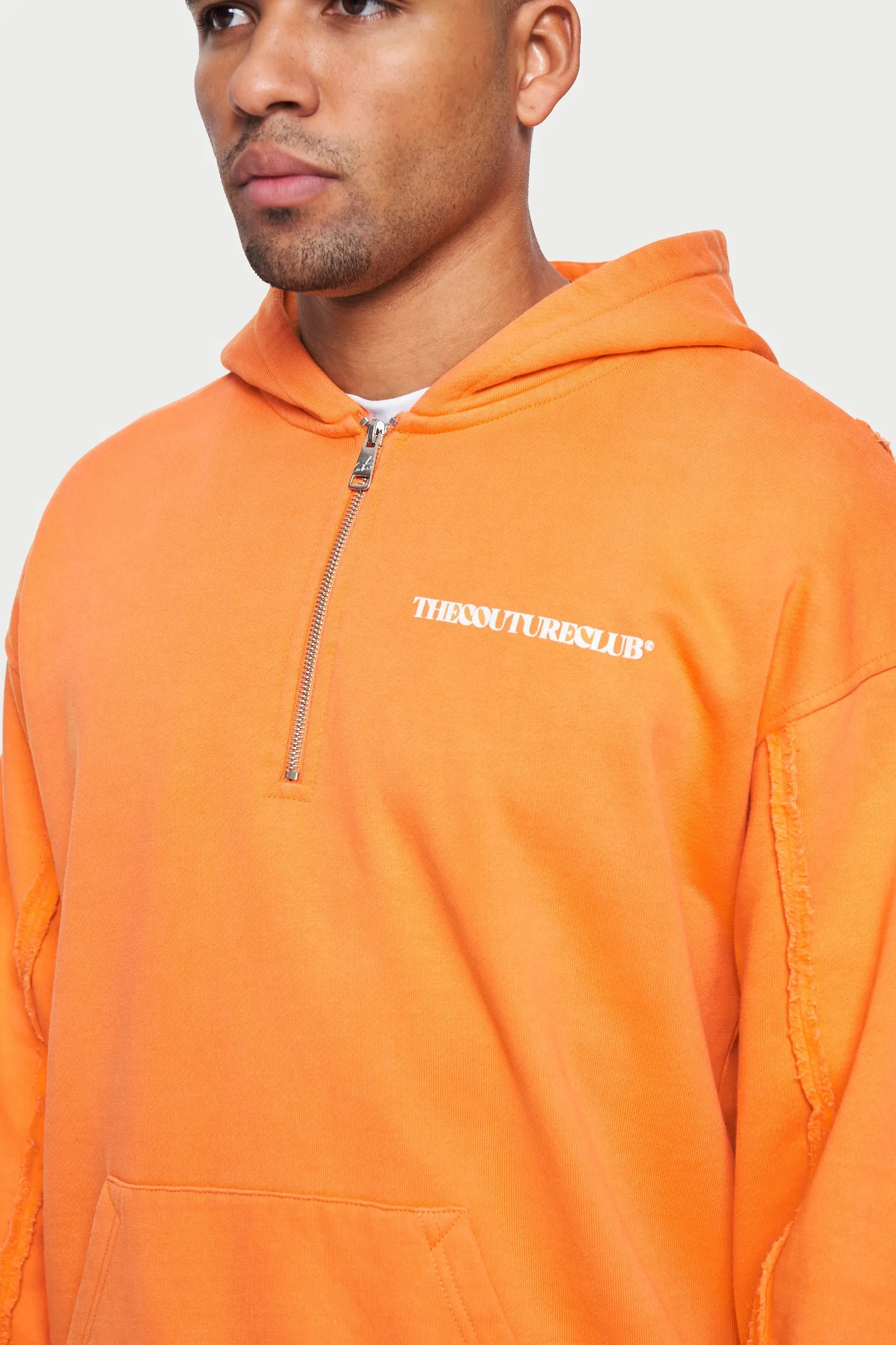 RAW SEAM QUARTER ZIP HOODIE - ORANGE